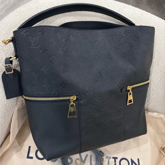 Authentic Louis Vuitton NEW MELIE Empreinte black with 2 straps discontinued